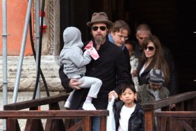 Brad Pitt hat black jacket Angelina Jolie sunglasses long coat